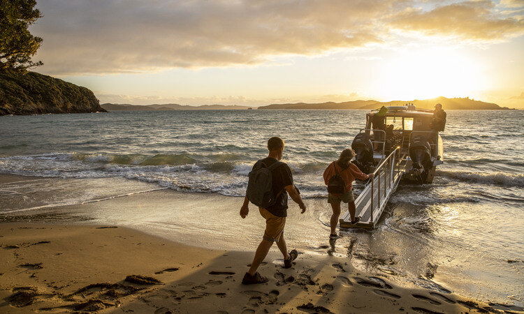 A couple boarding a boat at Urupukapuka Island, Bay of Islands, credit to Camilla Rutherford (TNZ)