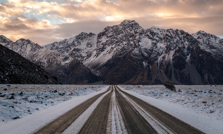 Road with snowy conditions at Tasman Valley Road