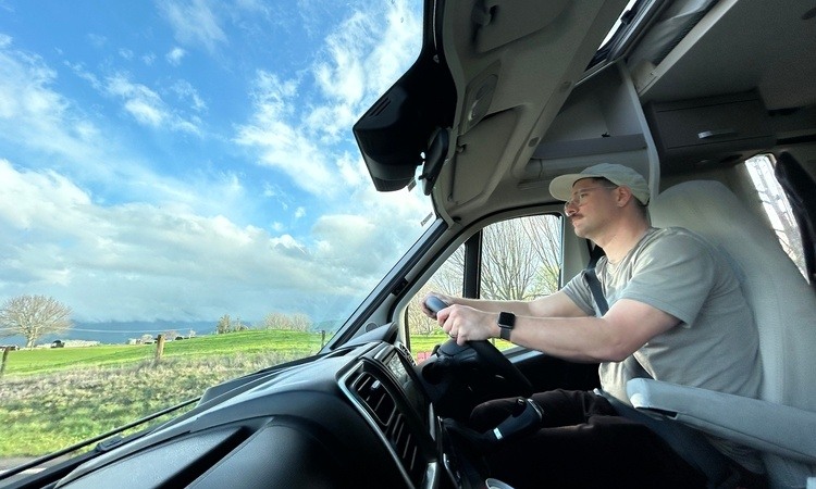 A man driving his Wilderness motorhome