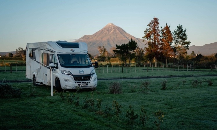 A Wilderness Motorhome parked up at a campsite in Taranaki