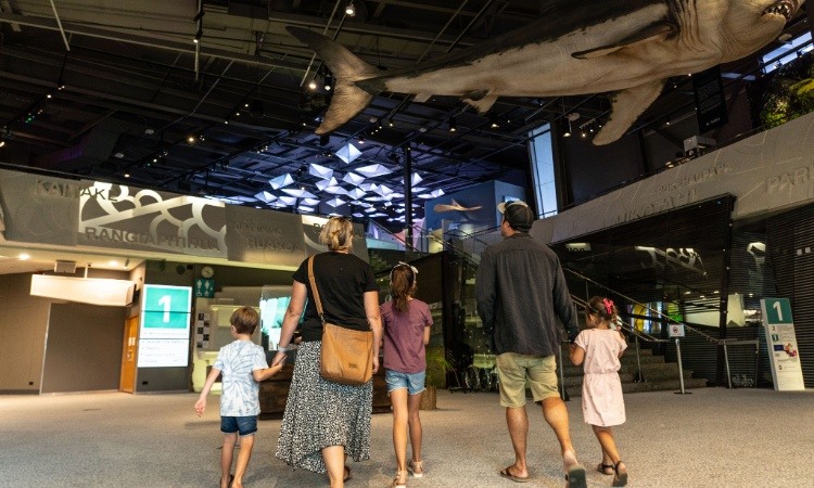 Family visiting Puke Ariki Museum