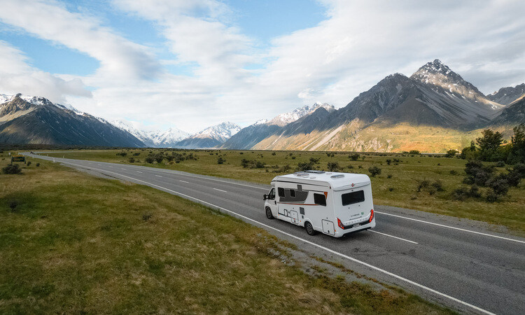 A Wilderness motorhome being driven on a highway in New Zealand