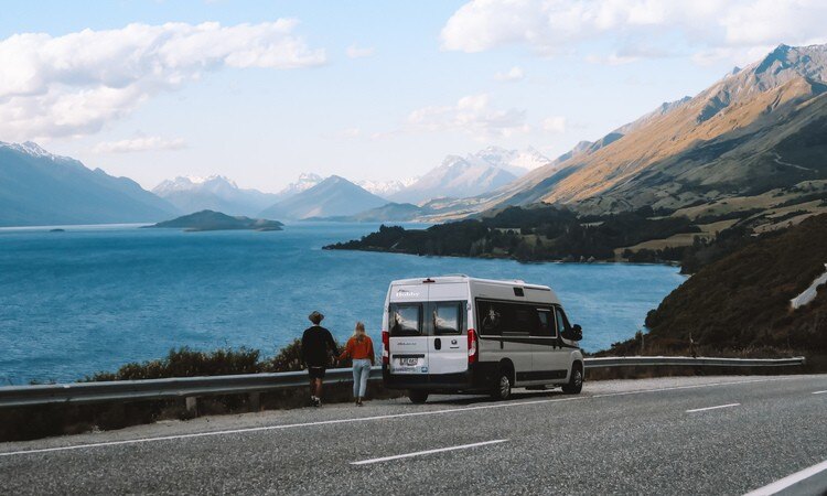 A couple travelling with a campervan in New Zealand