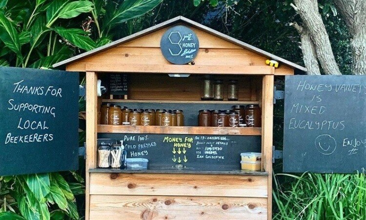 Honesty box honey roadside stall