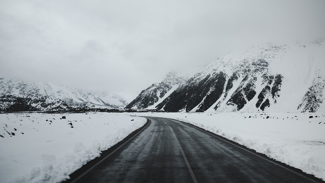 Snowy New Zealand road during winter