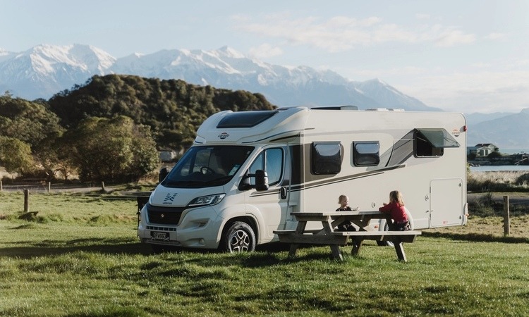 A Wilderness Motorhome parked up in Kaikoura with a view in the background